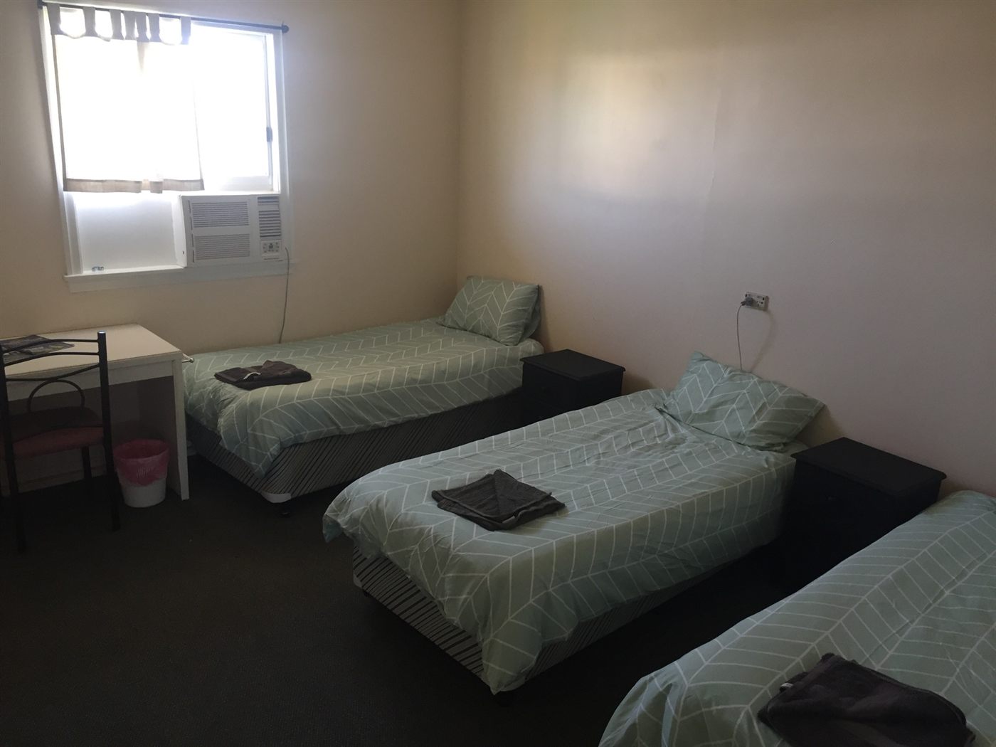 Upstairs guest room with single beds